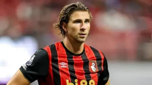 Illia Zabarnyi in Bournemouth’s black and red home kit during a Premier League match.